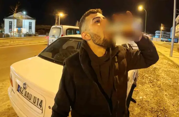 Alkollü araç kullanırken yakalandı, ehliyetine el konulunca araç başında içmeyi sürdürdü
